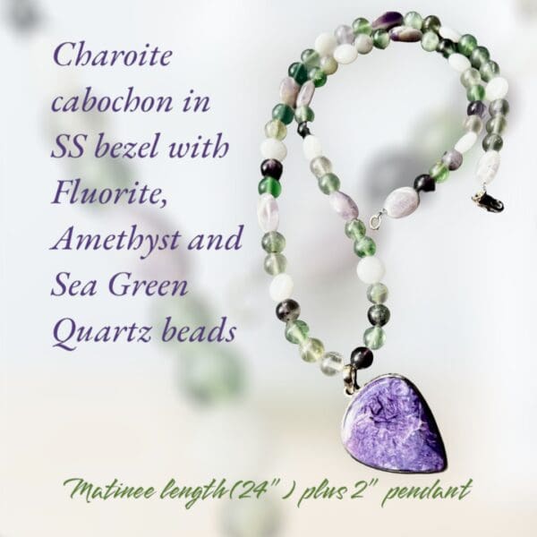 A necklace with purple beads and a green bead.