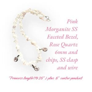 A pink bracelet with white pearls and silver charms.