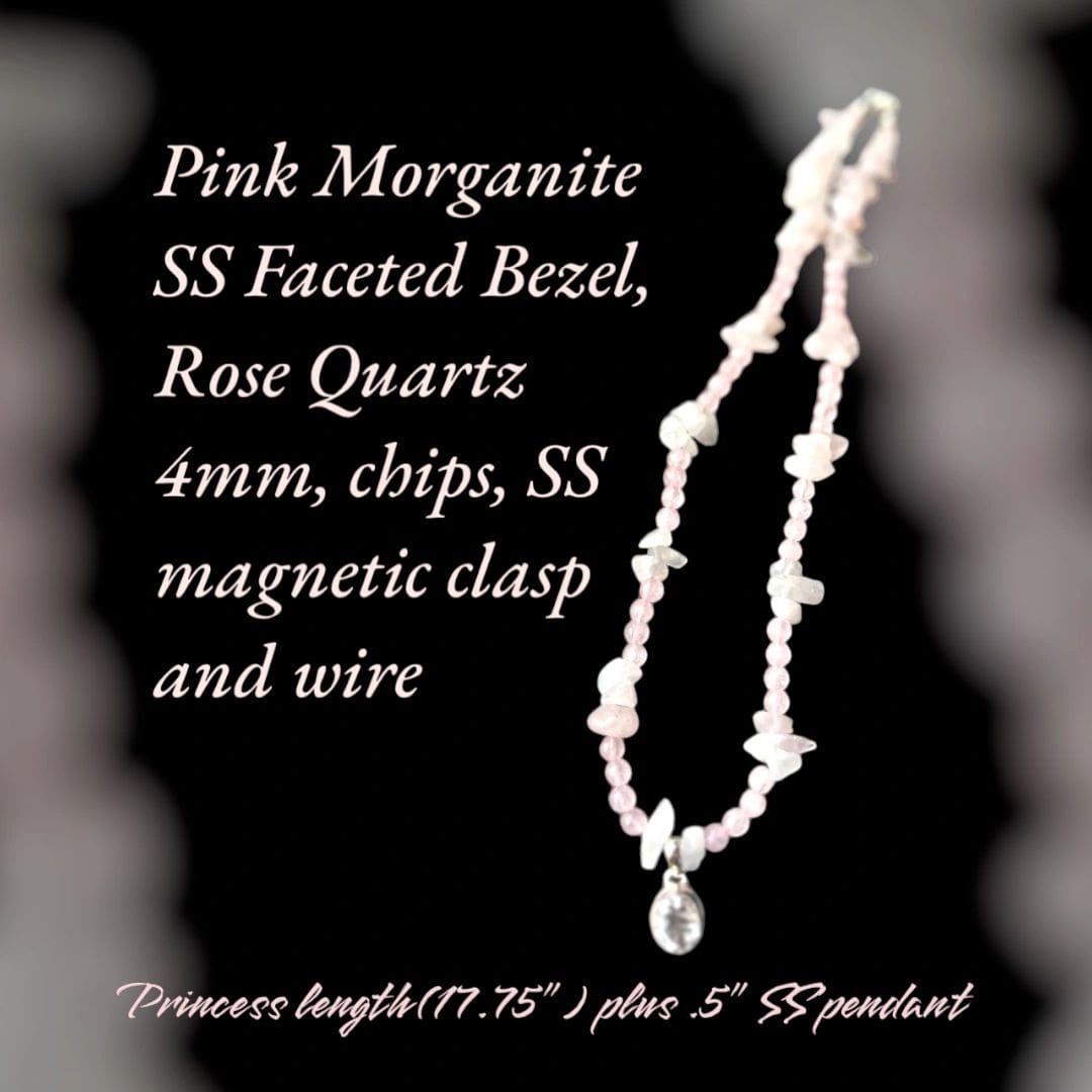 A necklace with a small white bead and a large pink bead.