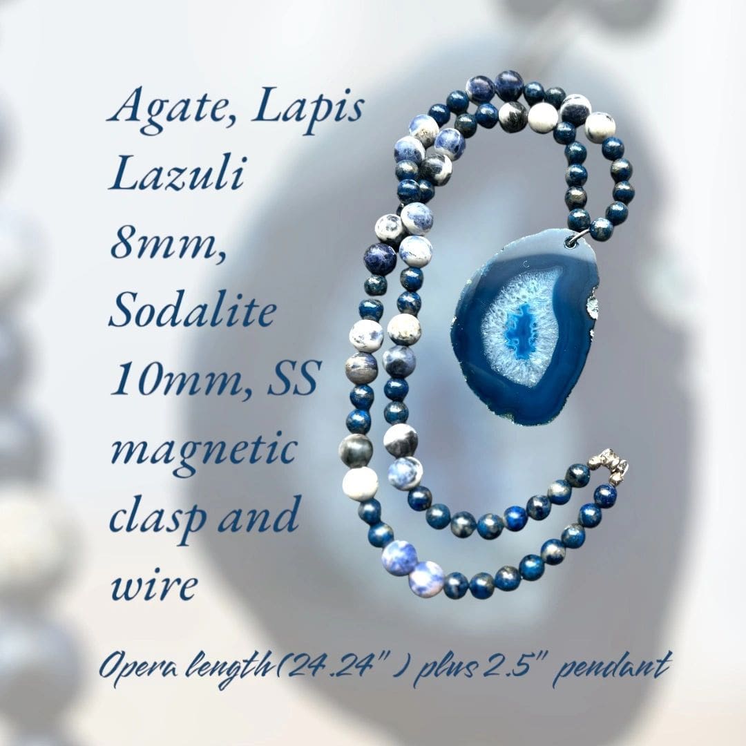 A necklace with an agate slice and blue beads.