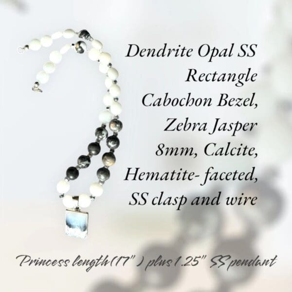 A necklace with different types of beads and a name.