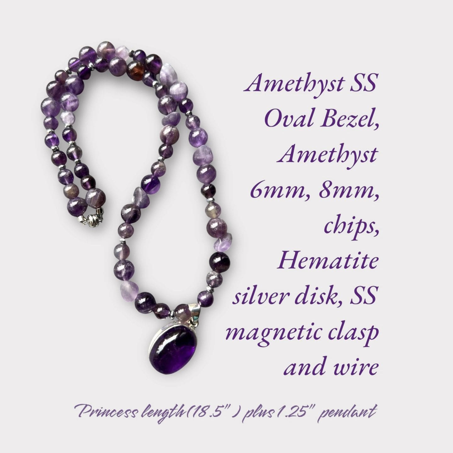 A necklace with amethyst and silver beads on it.