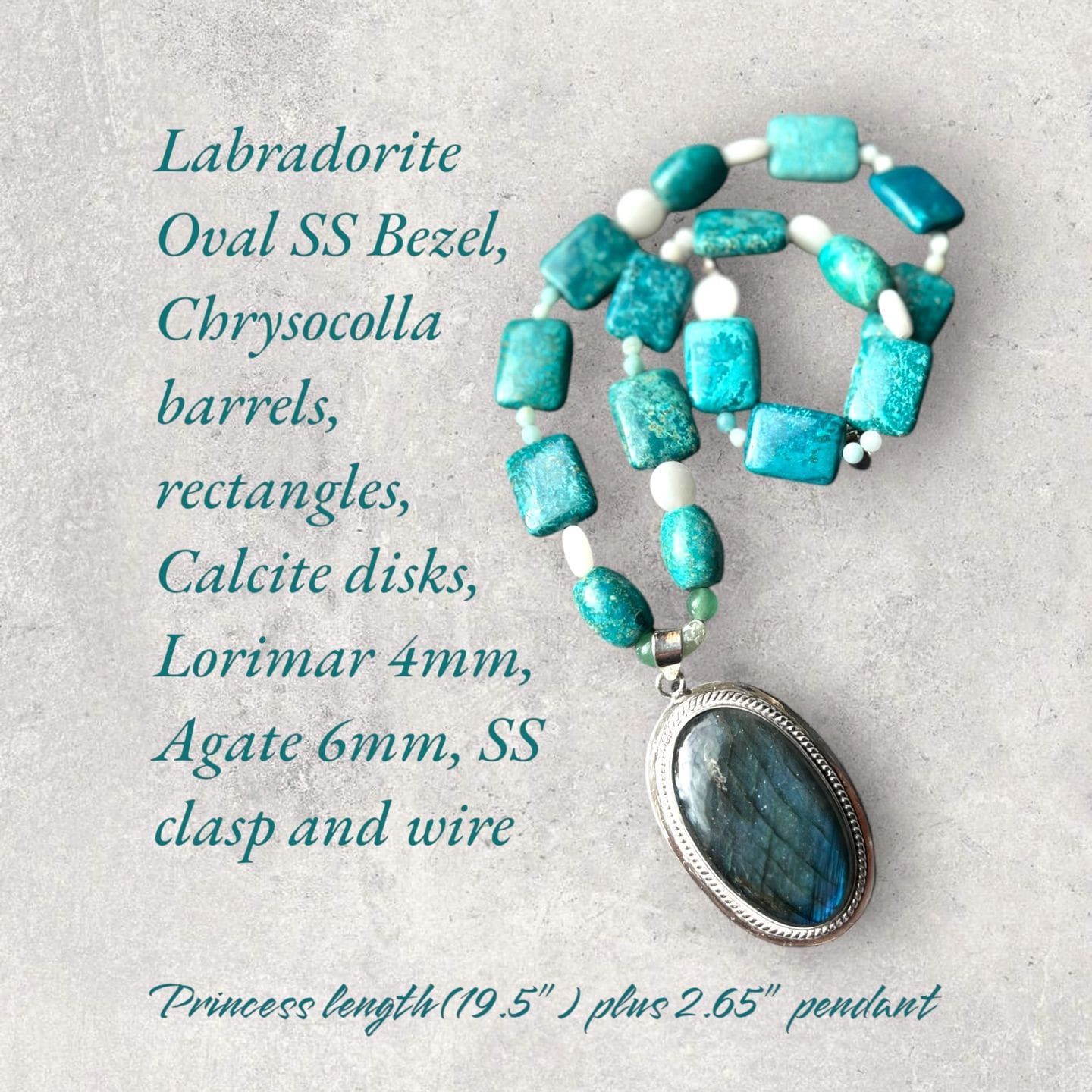 A necklace with a blue stone and turquoise beads.