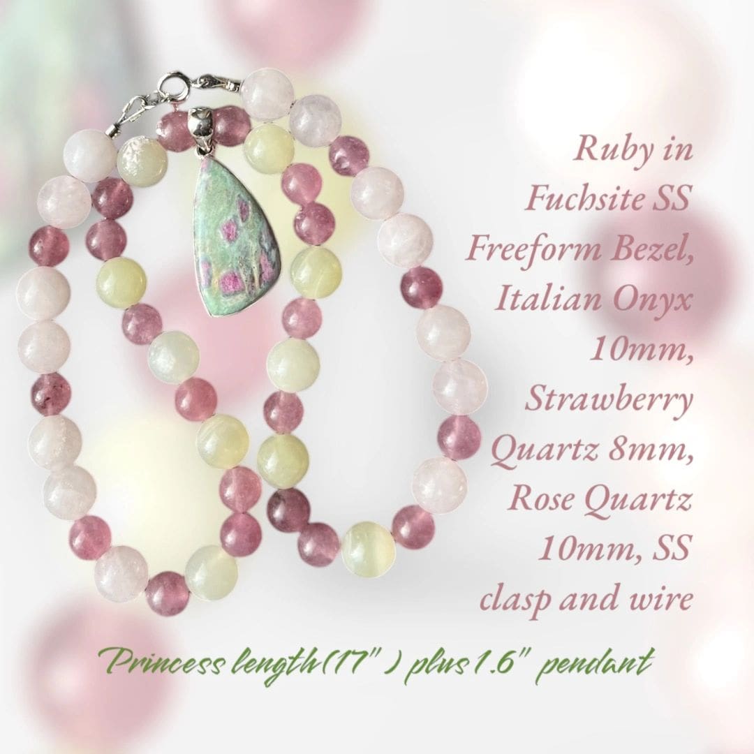 A necklace with pink and green beads on it.