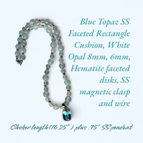 A necklace with a blue topaz and white opal beads.