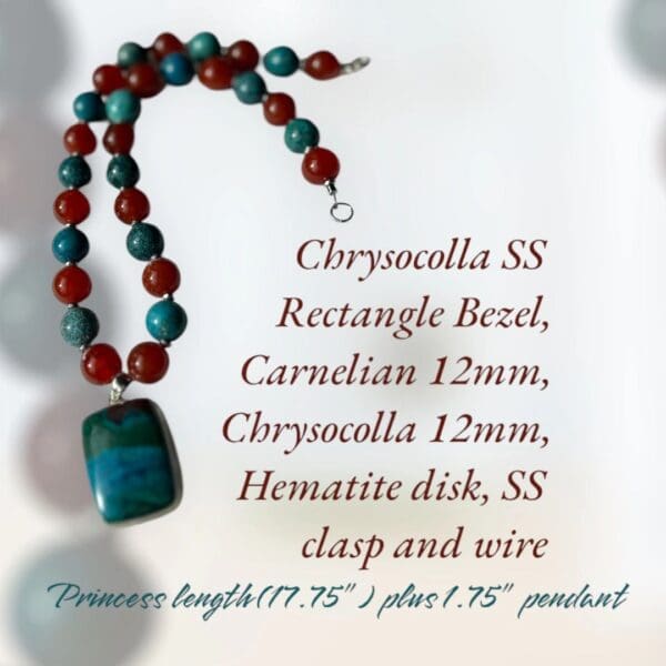 A necklace with a red and blue bead on it.