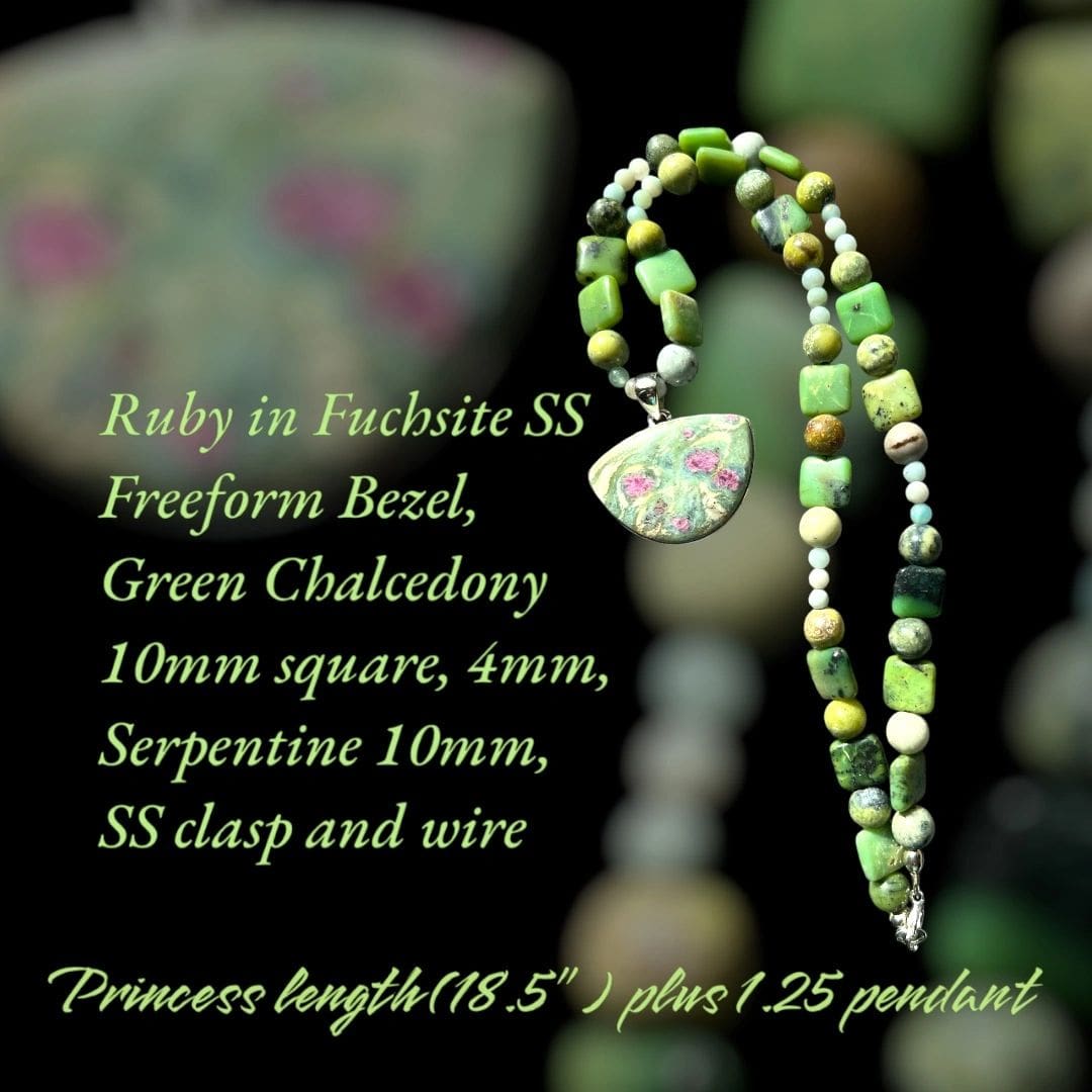 A close up of a necklace with green beads